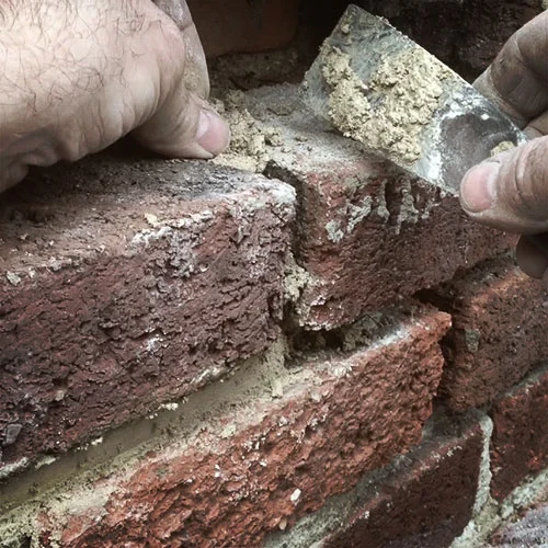 tuckpointing services on exterior brick home